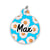 Round pet ID tag with a bright blue background and a fried egg pattern, personalized with the name "Max" in bold black script.